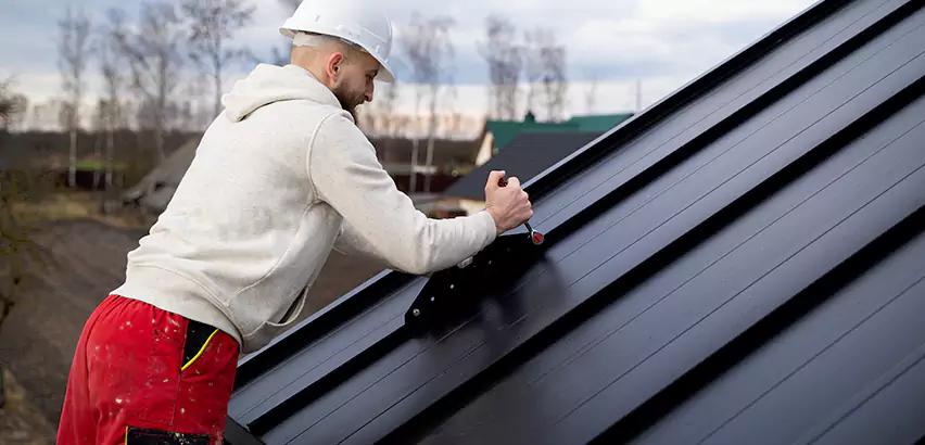 Tin Roof Ridge Cap Installation in Ramona